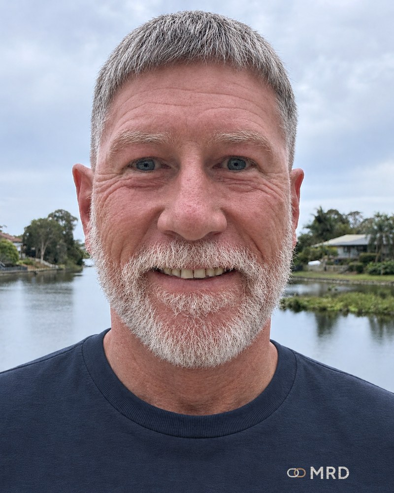 Nicholas Lockhart beside the lake, October 2026